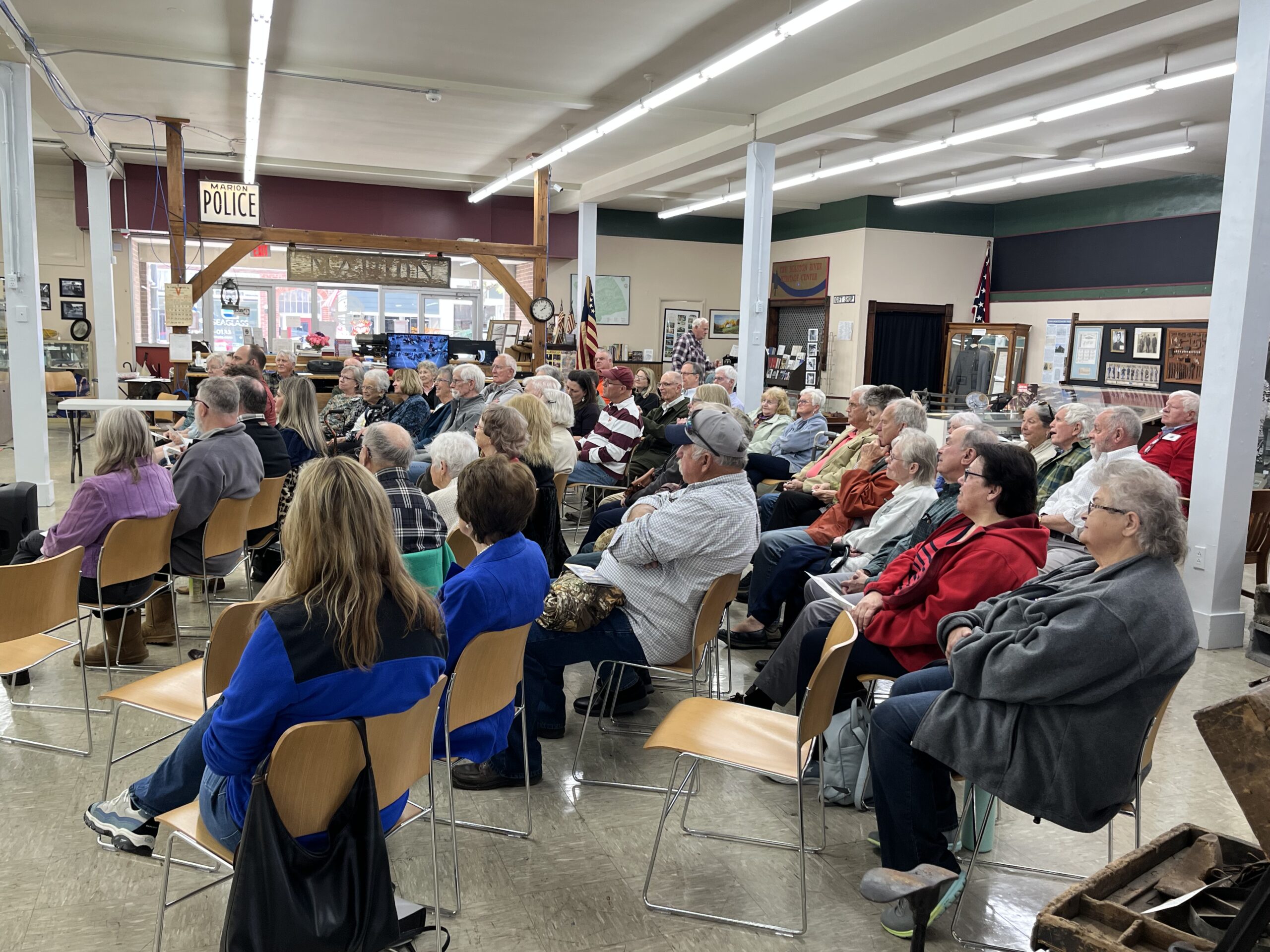 Describe the museum program or community event shown